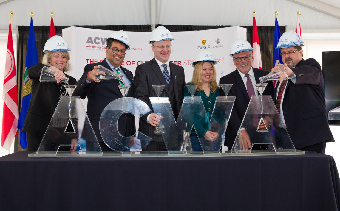 Taking part in the unveiling Tuesday of the Advancing Canadian Wastewater Assets facility in south Calgary were, from left: University of Calgary President Elizabeth Cannon; Calgary Mayor Naheed Nenshi; Hon. Donald Scott, minister, Innovation and Advanced Education; Hon. Michelle Rempel, minister of state (Western Economic Development); Pierre Normand, vice-president of External Relations and Communications, Canada Foundation for Innovation; and Craig Marvin, global environmental industry manager, Agilent T