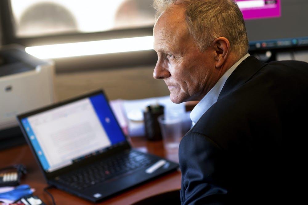 Card sits in his office at the University of California, Berkeley. 