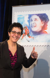 Danielle Goyette gives the thumbs-up as she appeared before a crowd at the announcement at Canada’s Sports Hall of Fame in Calgary. Photos by Riley Brandt, University of Calgary 