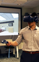 Dante Luu BN'22 demos his virtual reality project in the TFDL VR Development Room.