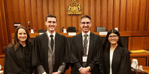 Four student participants in a mooting competition