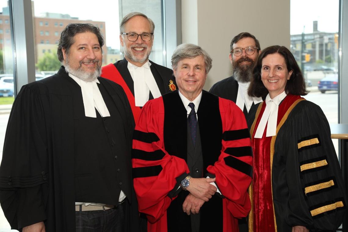 Ian Holloway (center) after receiving an honorary degree from the Law Society of Ontario
