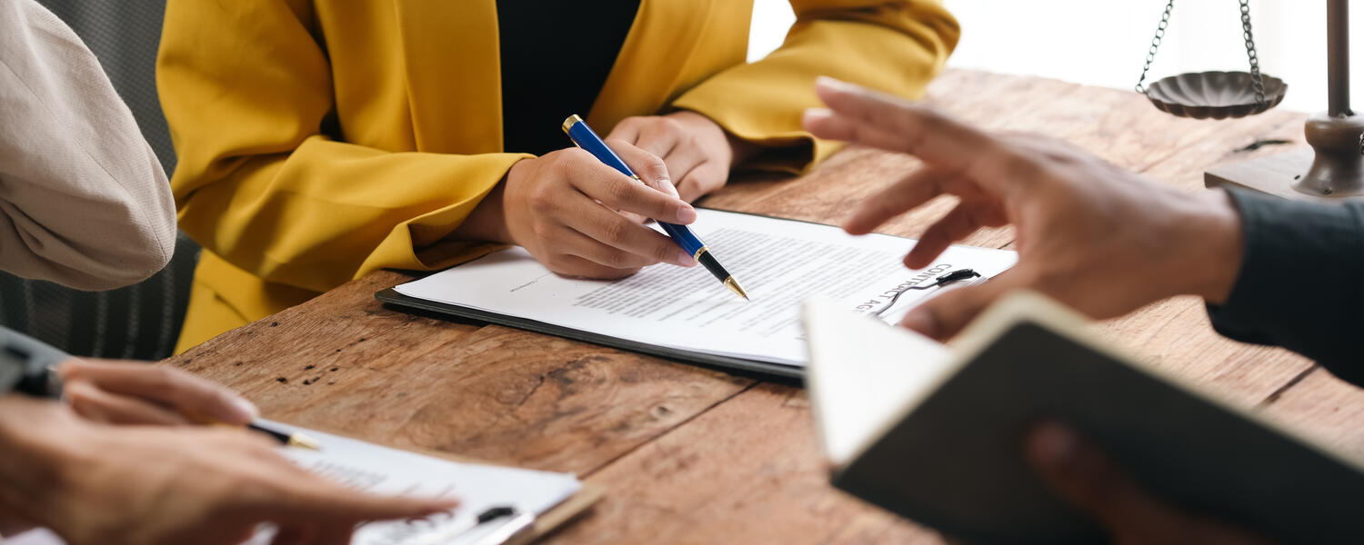 Lawyers discussing over table