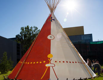 The UCalgary tipi stands in the sunshine