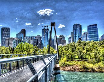 A bridge over the Bow River leading to downtown Calgary