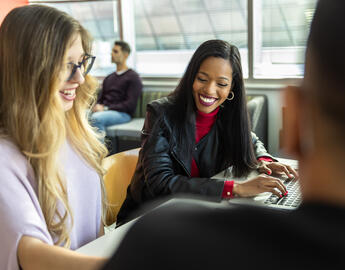 student working at table